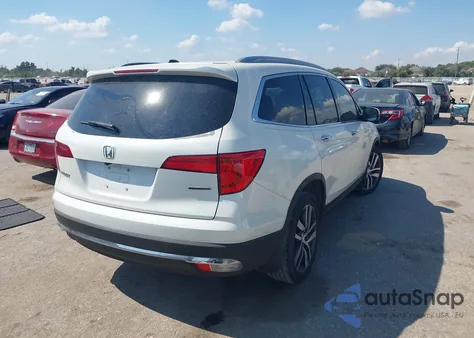 2017 Honda Pilot Touring z USA, uszkodzony, nr VIN 5FNYF5H94HB047661